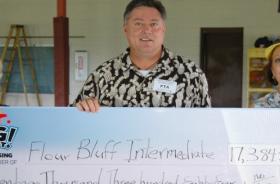 Flour Bluff Intermediate School fundraising team holding check